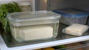 How to store tofu safely in a covered container in the refrigerator