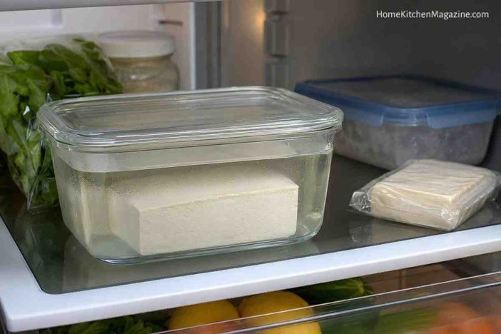 How to store tofu safely in a covered container in the refrigerator